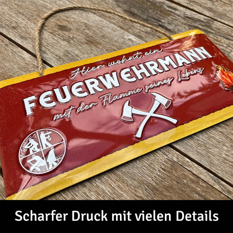 LANOLU Kordelschild Hier wohnt ein Feuerwehrmann mit der Flamme seines Lebens 16x32cm