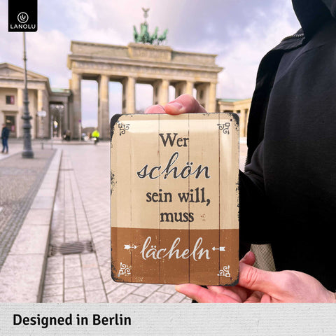 Blechschild Wer schön sein will, muss lächeln